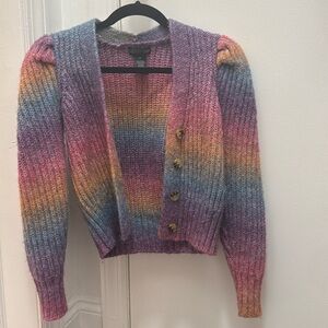 Multi-color rainbow knit cardigan. Puff sleeve with 4 buttons.